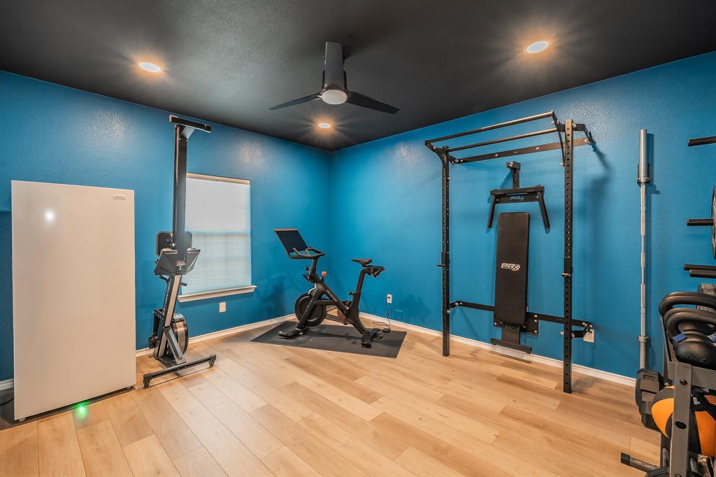 10417 Boxthorn Court Fort Worth, TX 76177 - Photo 35 of 40 a view of a room with gym equipment