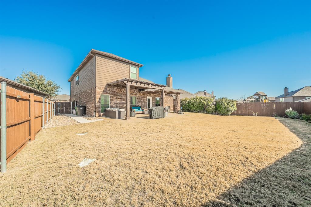 10417 Boxthorn Court Fort Worth, TX 76177 - Photo 38 of 40 a house with a outdoor space