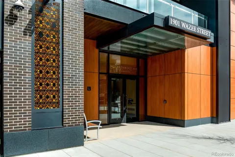 a view of a balcony with wooden floor