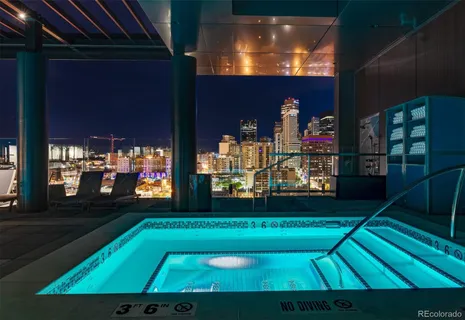 a kitchen with a cabinets and white appliances