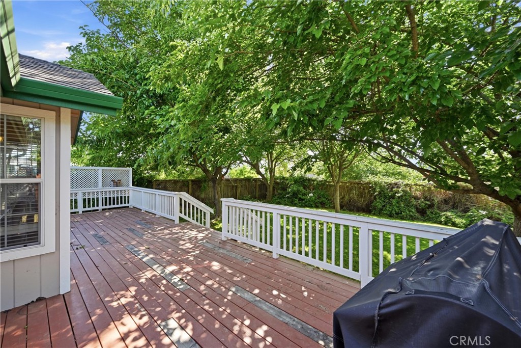 18846 Horseshoe Road Hidden Valley Lake, CA 95467 - Photo 25 of 31 a view of a chairs and deck in the backyard