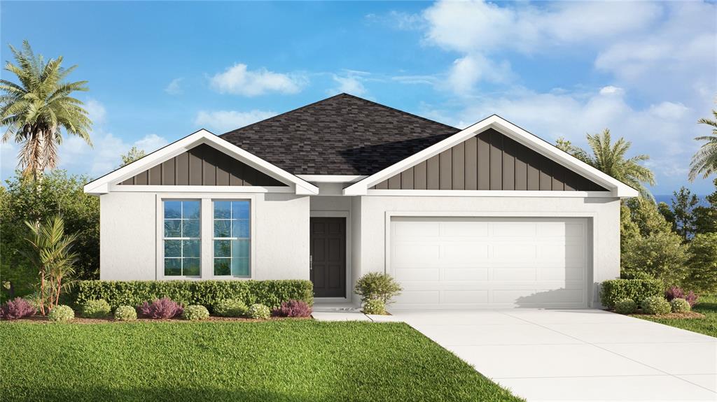 1497 Laredo Avenue Spring Hill, FL 34608 - Photo 1 of 1 a front view of a house with a yard