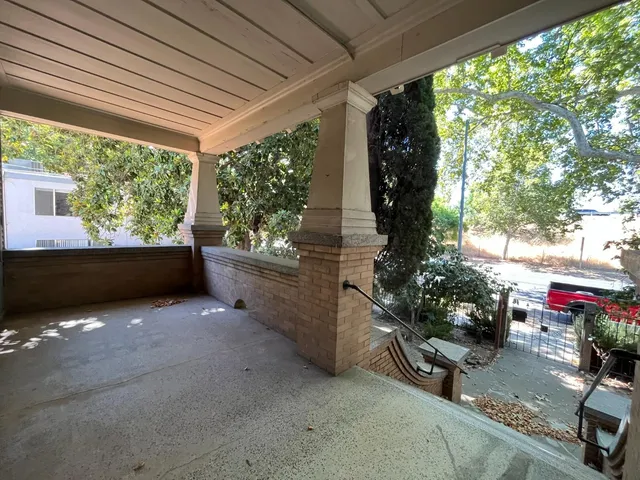 a house view with a garden space