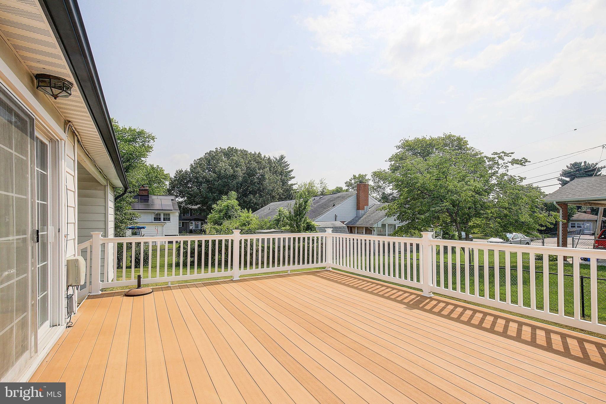 181 Dale Road Pasadena, MD 21122 - Photo 3 of 36 Large deck overlooking yard and pool