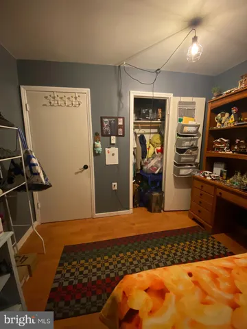 a kitchen with a refrigerator and a stove