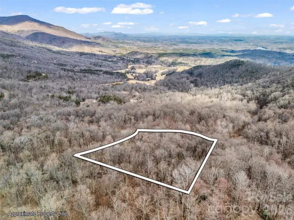 a view of roof and mountain