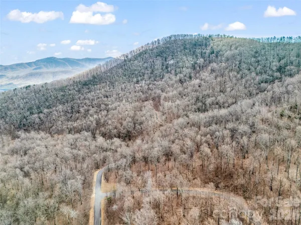 a view of a dry room with wooden floor