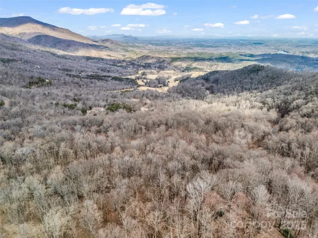 a view of mountains and valleys