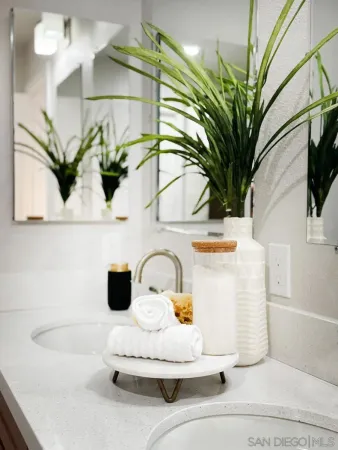 a white bath tub sitting in a bathroom