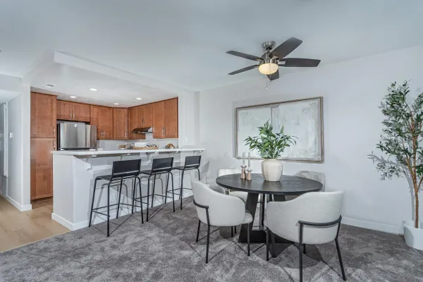 a view of a dining room with furniture