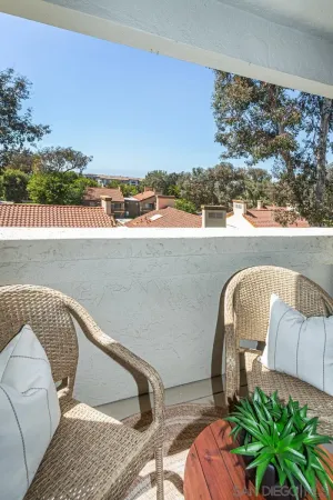 a picture of a couch in a balcony