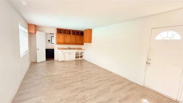 a view of a kitchen with a sink