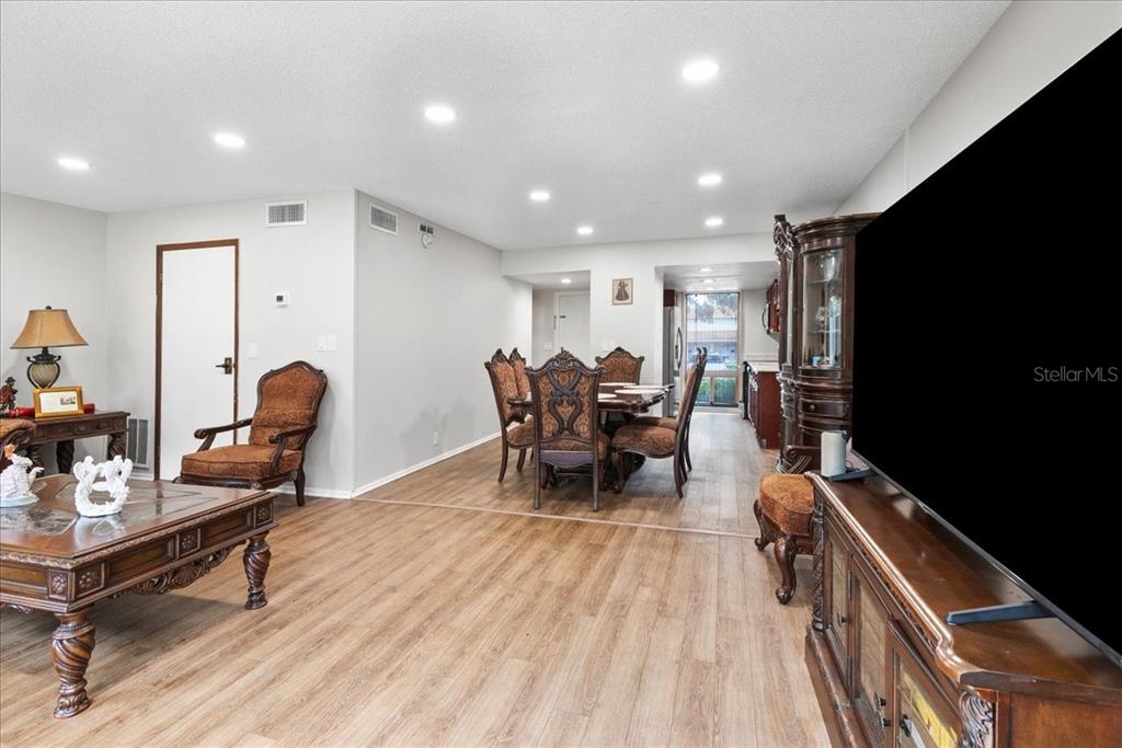 30 Moree Loop, Unit 39 Winter Springs, FL 32708 - Photo 11 of 32 a living room with furniture and a flat screen tv