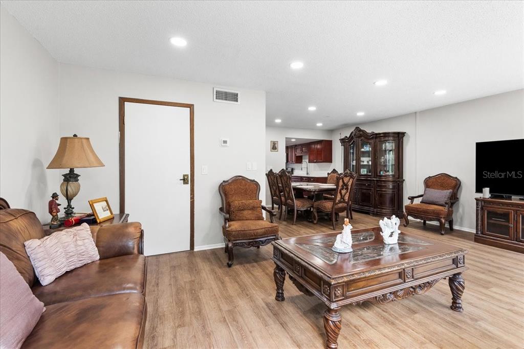 30 Moree Loop, Unit 39 Winter Springs, FL 32708 - Photo 13 of 32 a living room with furniture and a flat screen tv