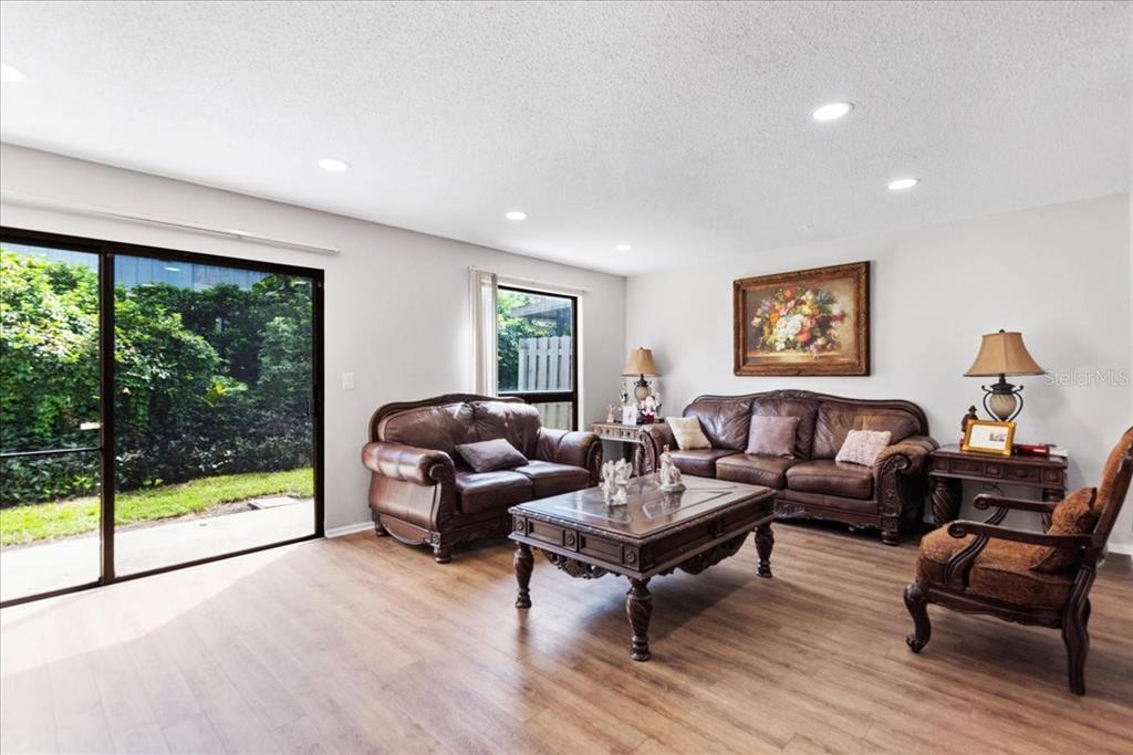 30 Moree Loop, Unit 39 Winter Springs, FL 32708 - Photo 14 of 32 a living room with furniture and a window