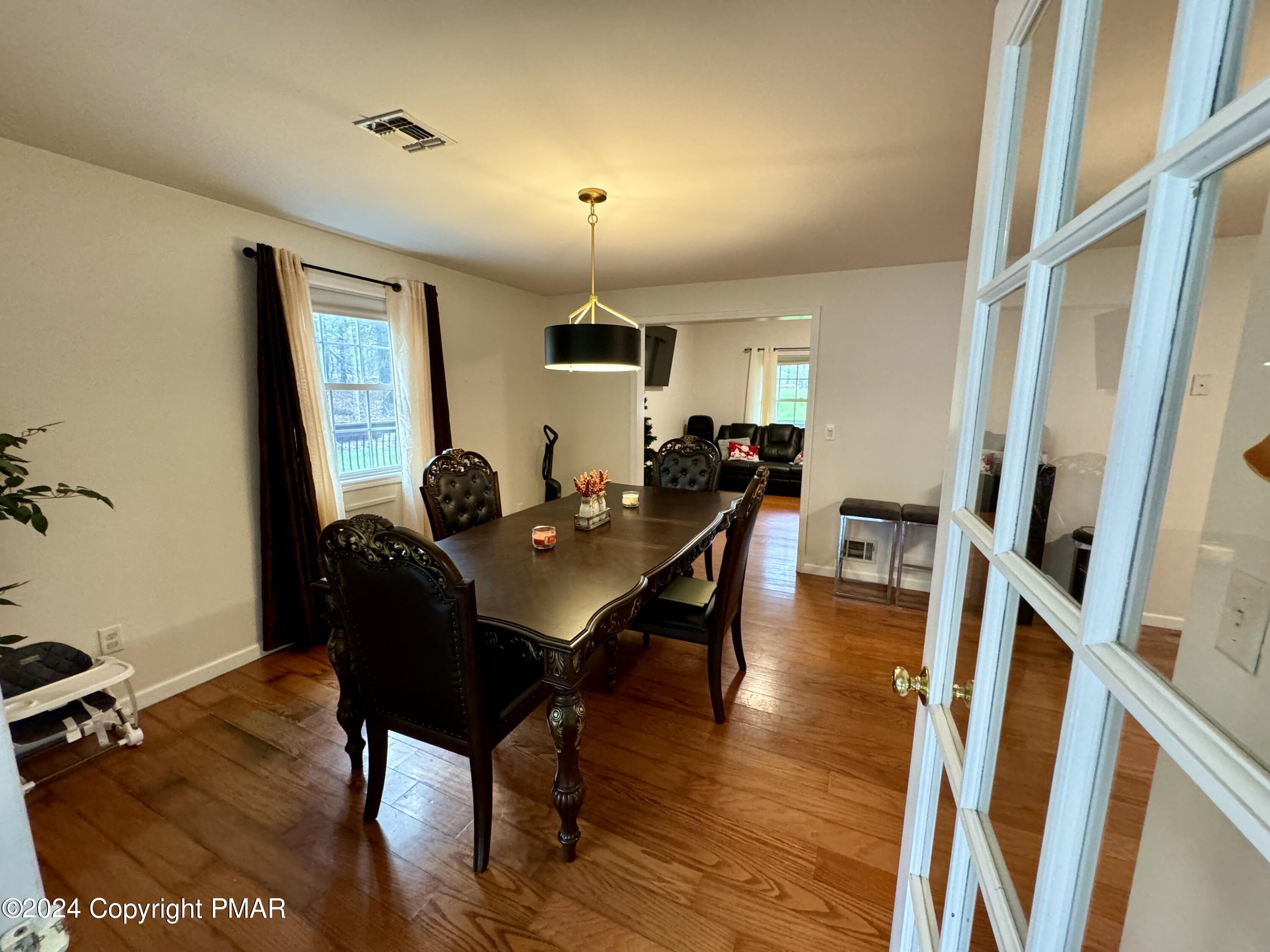 146 Hound Road Dingmans Ferry, PA 18328 - Photo 12 of 50 a view of a workspace with furniture window and wooden floor