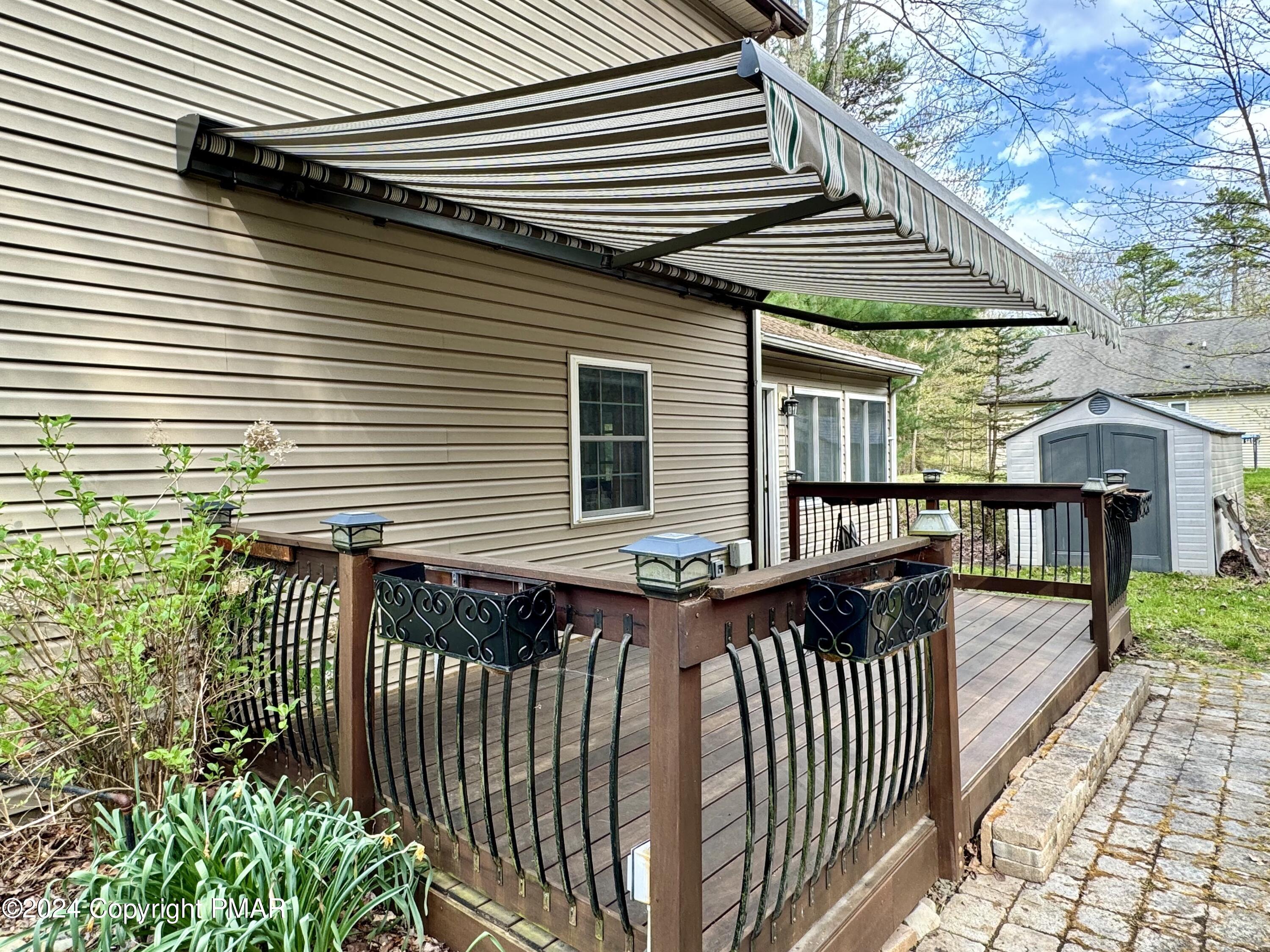 146 Hound Road Dingmans Ferry, PA 18328 - Photo 25 of 50 a front view of a house with a garden