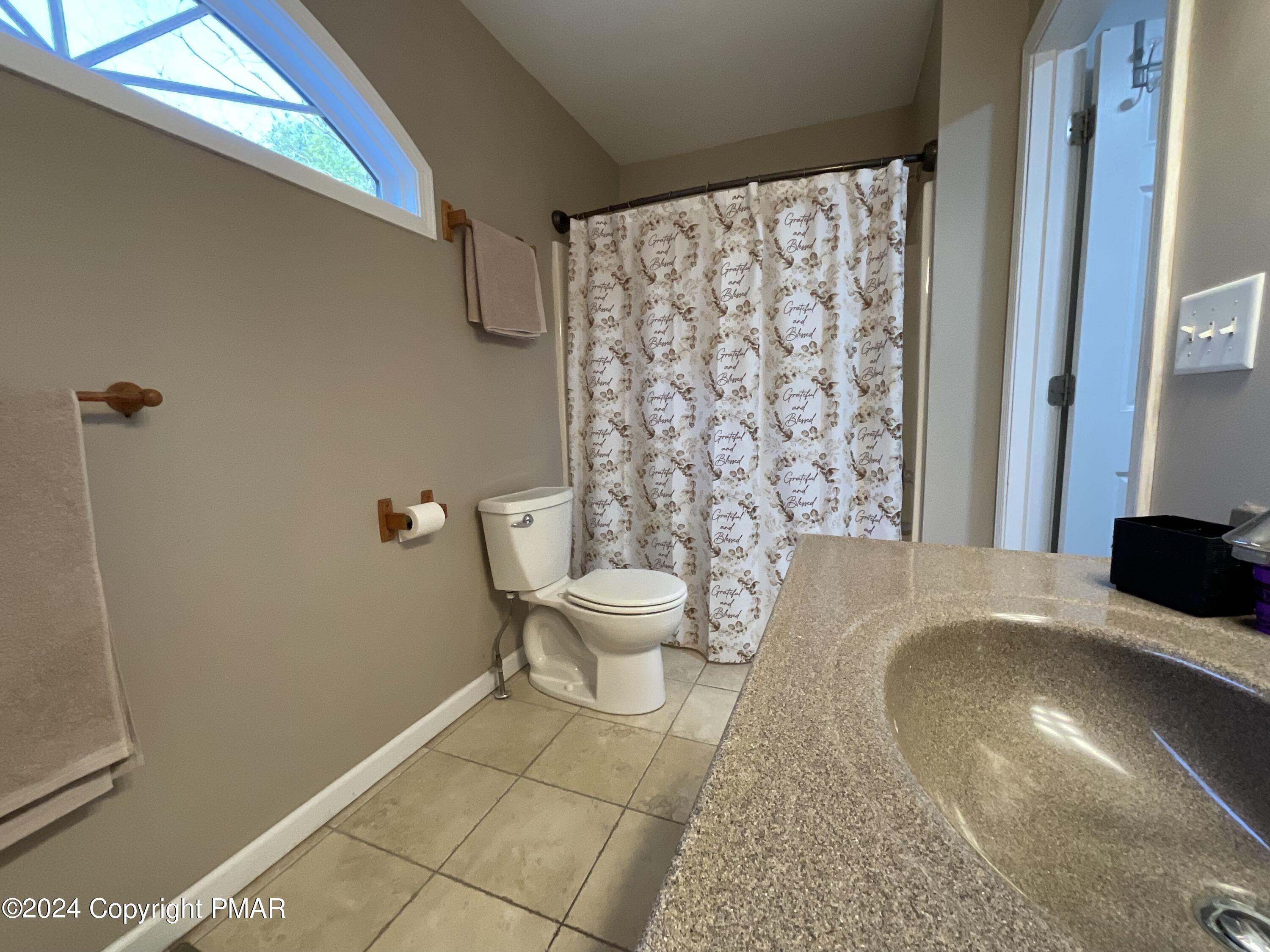 146 Hound Road Dingmans Ferry, PA 18328 - Photo 44 of 50 a bathroom with a toilet and a shower