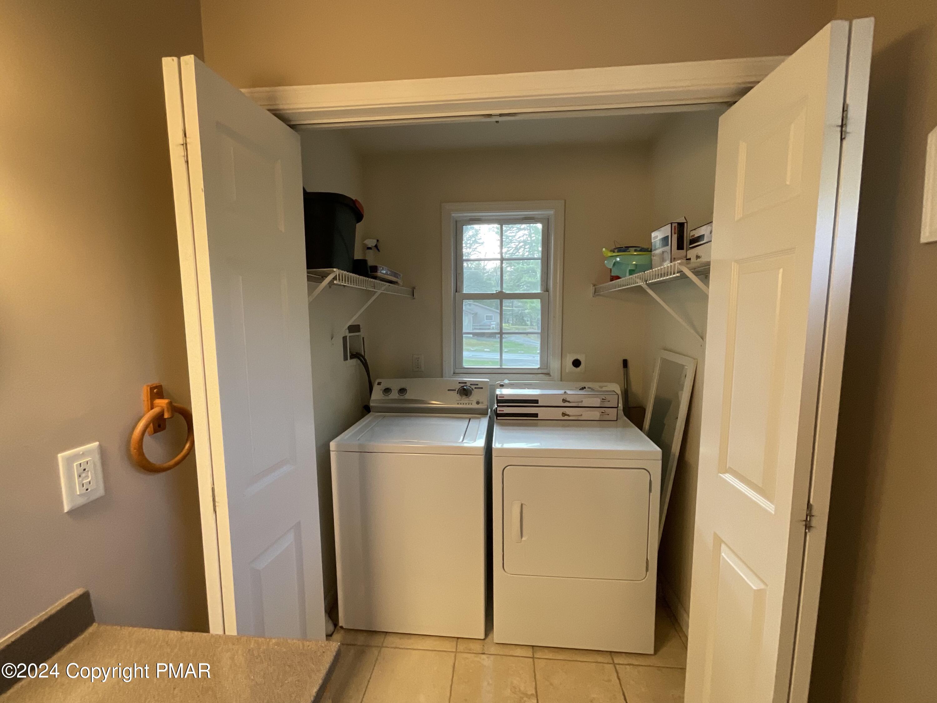 146 Hound Road Dingmans Ferry, PA 18328 - Photo 47 of 50 a utility room with dryer and washer