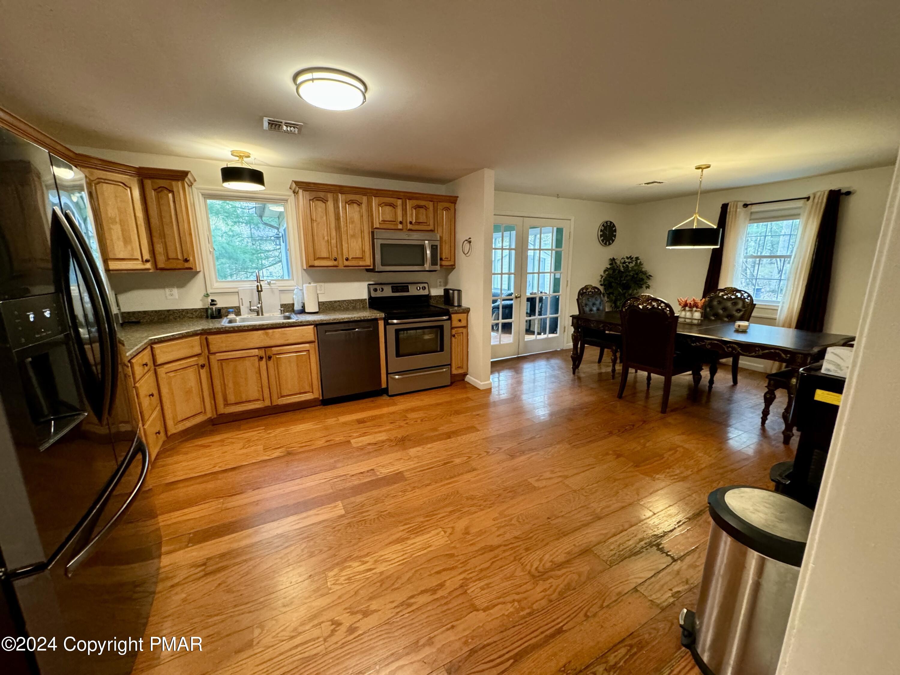 146 Hound Road Dingmans Ferry, PA 18328 - Photo 6 of 50 a large kitchen with lots of counter space
