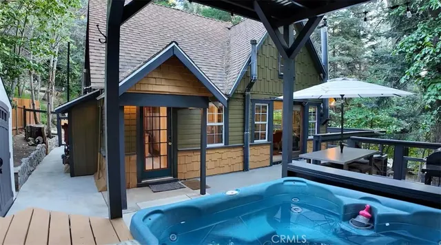 swimming pool view with a seating space
