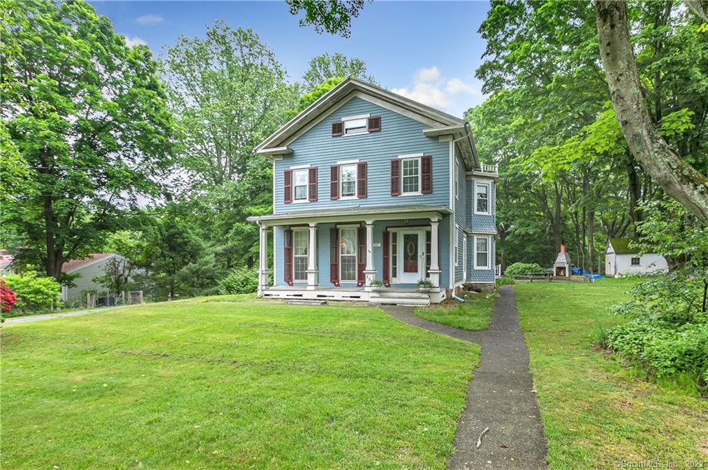 292 Shelton Road Trumbull, CT 06611 - Photo 1 of 1 a front view of a house with a yard