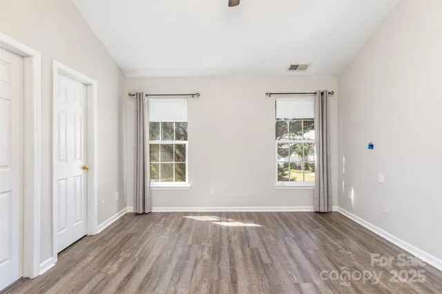 a bathroom with a sink a vanity and a mirror