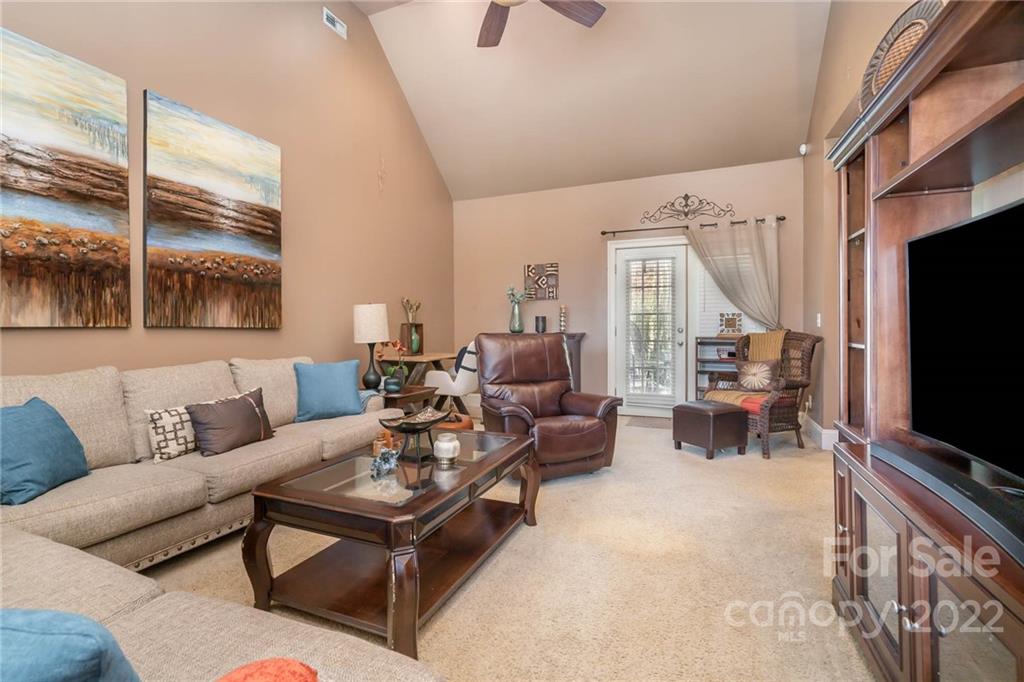 2738 Reservation Road Rock Hill, SC 29730 - Photo 23 of 28 a living room with furniture and a flat screen tv