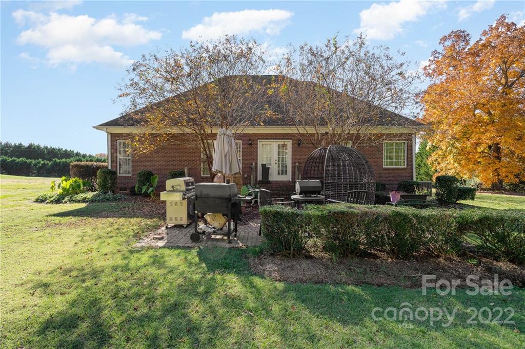 2738 Reservation Road Rock Hill, SC 29730 - Photo 26 of 28 a view of a house with backyard sitting area and garden