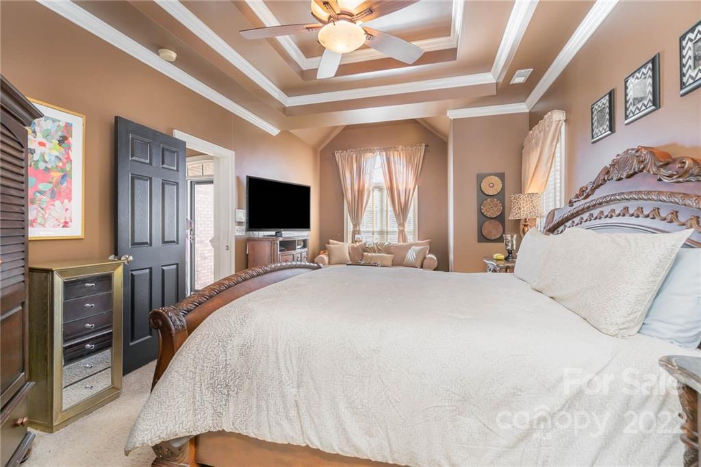 2738 Reservation Road Rock Hill, SC 29730 - Photo 9 of 28 a bedroom with a bed window and a flat screen tv