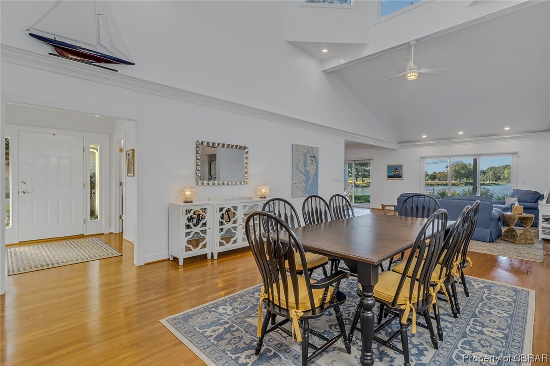 192 Bayberry Point Lane Kilmarnock, VA 22482 - Photo 17 of 49 Wood floored dining area with vaulted ceiling and a high ceiling
