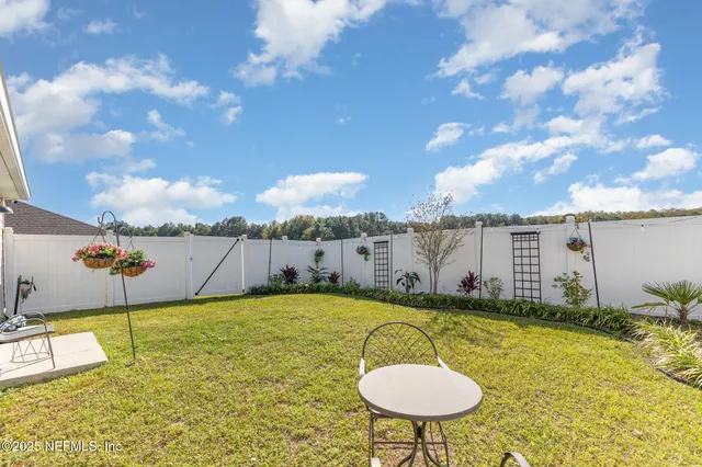 a view of a swimming pool with a lounge chair