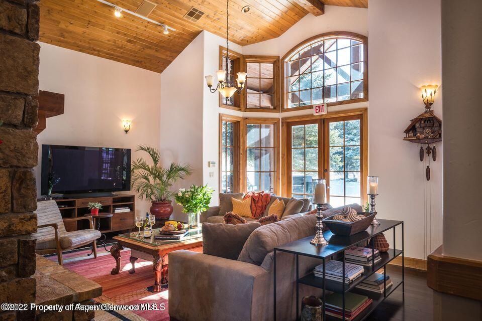 38 Diamond A Ranch Road Carbondale, CO 81623 - Photo 13 of 44 a living room with fireplace furniture and a flat screen tv