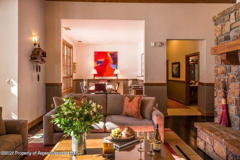 38 Diamond A Ranch Road Carbondale, CO 81623 - Photo 14 of 44 a living room with furniture flowerpot and wooden floor
