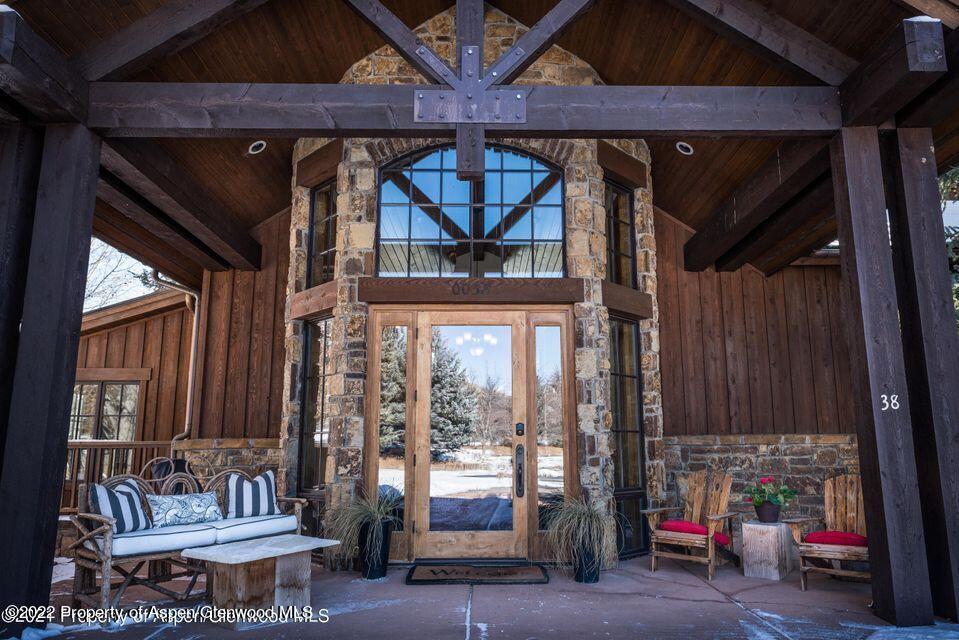 38 Diamond A Ranch Road Carbondale, CO 81623 - Photo 2 of 44 a living room with a couch and a table