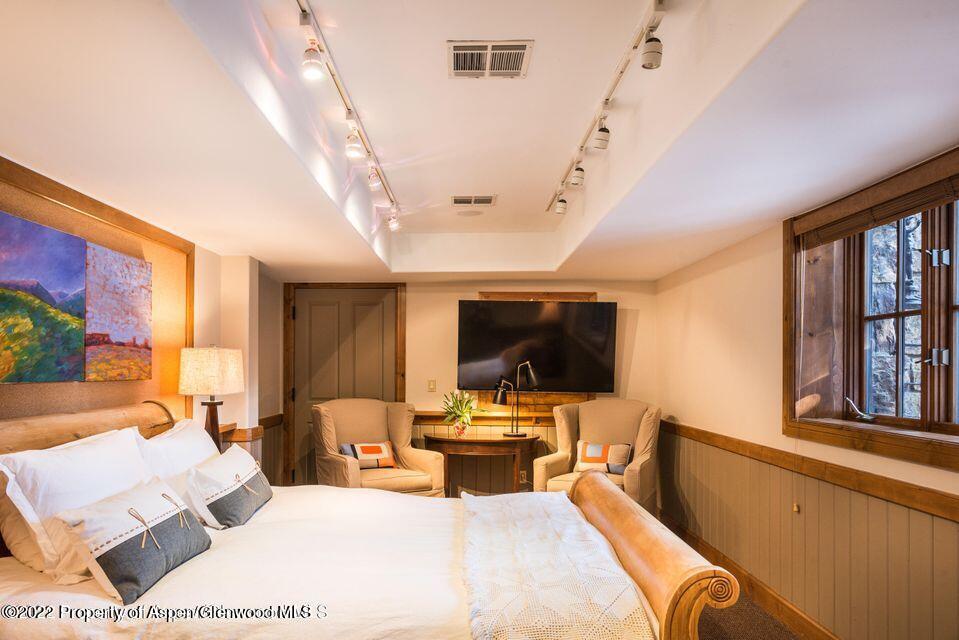 38 Diamond A Ranch Road Carbondale, CO 81623 - Photo 28 of 44 a living room with furniture and a flat screen tv