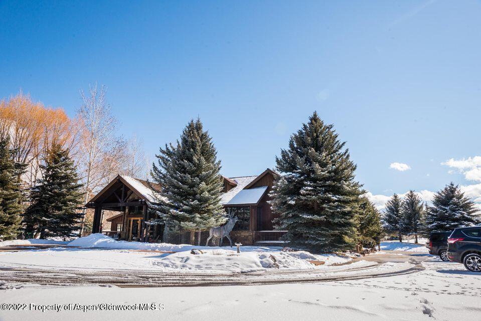 38 Diamond A Ranch Road Carbondale, CO 81623 - Photo 3 of 44 a view of building with snow on the road