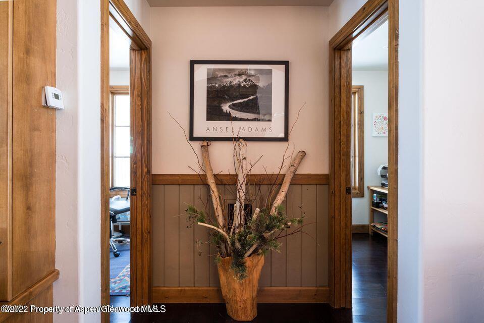 38 Diamond A Ranch Road Carbondale, CO 81623 - Photo 32 of 44 a view of a hallway with wooden floor and entryway
