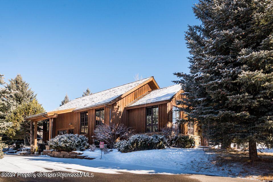 38 Diamond A Ranch Road Carbondale, CO 81623 - Photo 5 of 44 a front view of a house with garden
