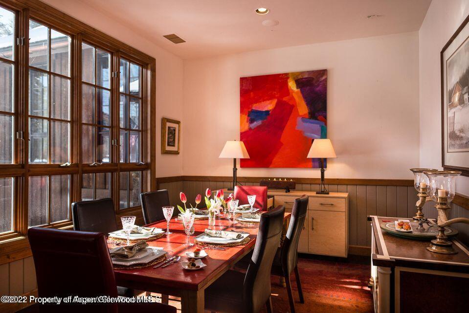 38 Diamond A Ranch Road Carbondale, CO 81623 - Photo 10 of 44 a view of a dining room with furniture window and wooden floor