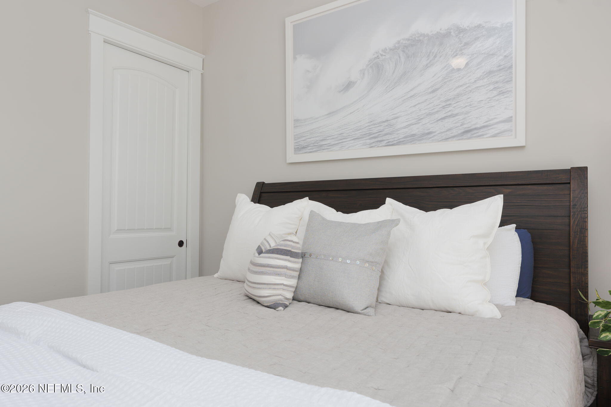 599 Timber Bridge Lane Atlantic Beach, FL 32233 - Photo 15 of 60 a large white bed in a white room