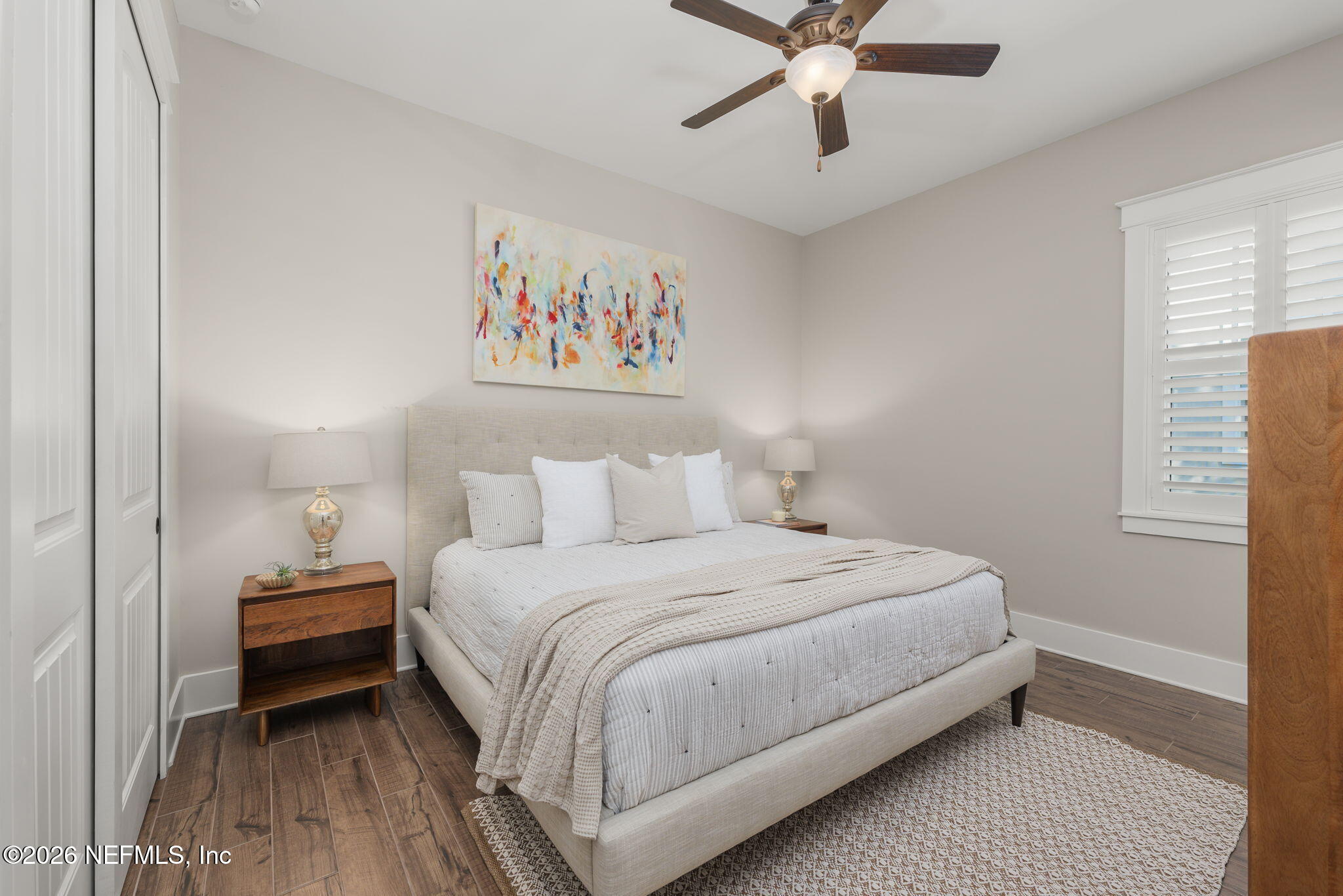 599 Timber Bridge Lane Atlantic Beach, FL 32233 - Photo 22 of 60 a bedroom with a bed and a chandelier