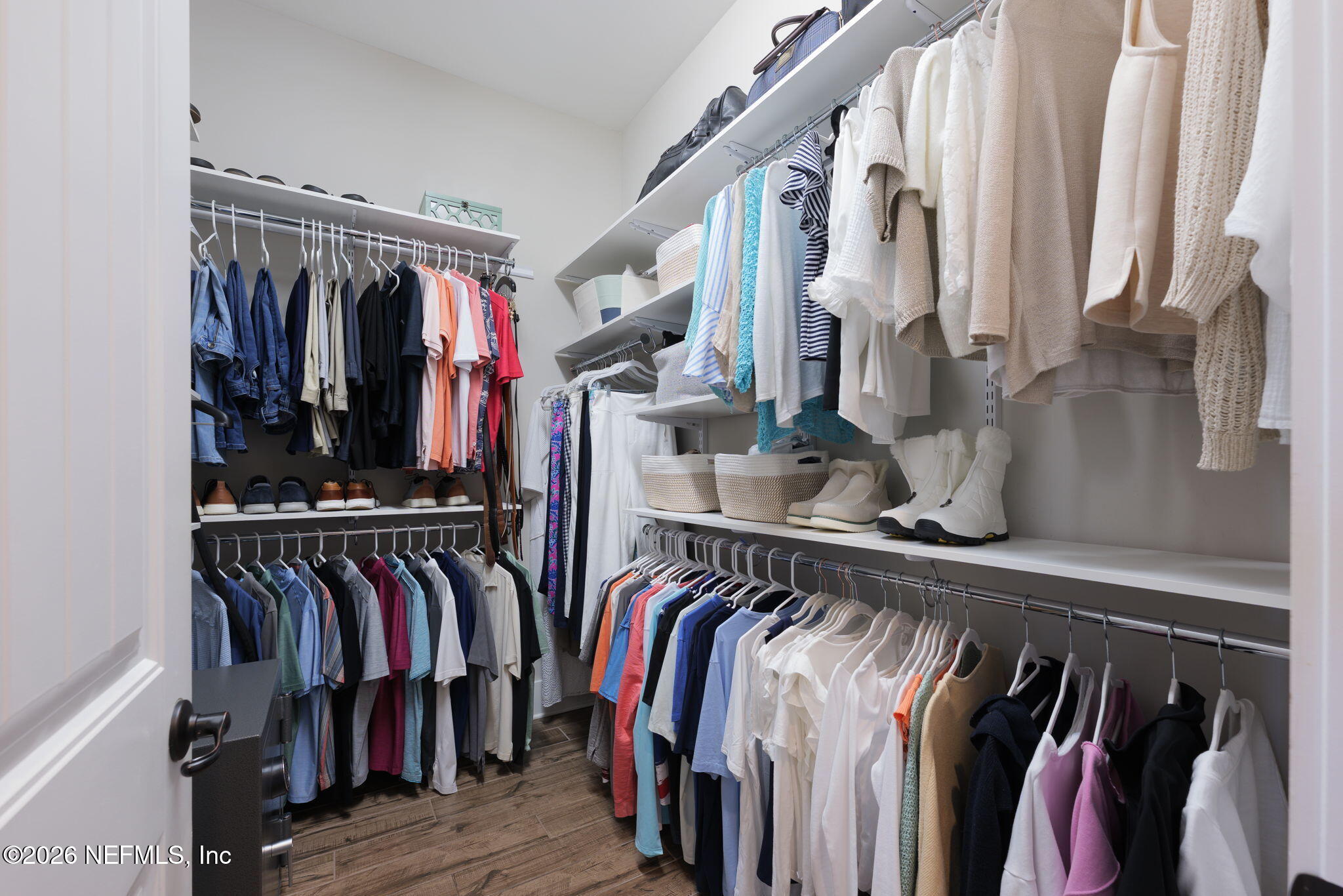 599 Timber Bridge Lane Atlantic Beach, FL 32233 - Photo 39 of 60 a view of walk in closet with clothes and shoes