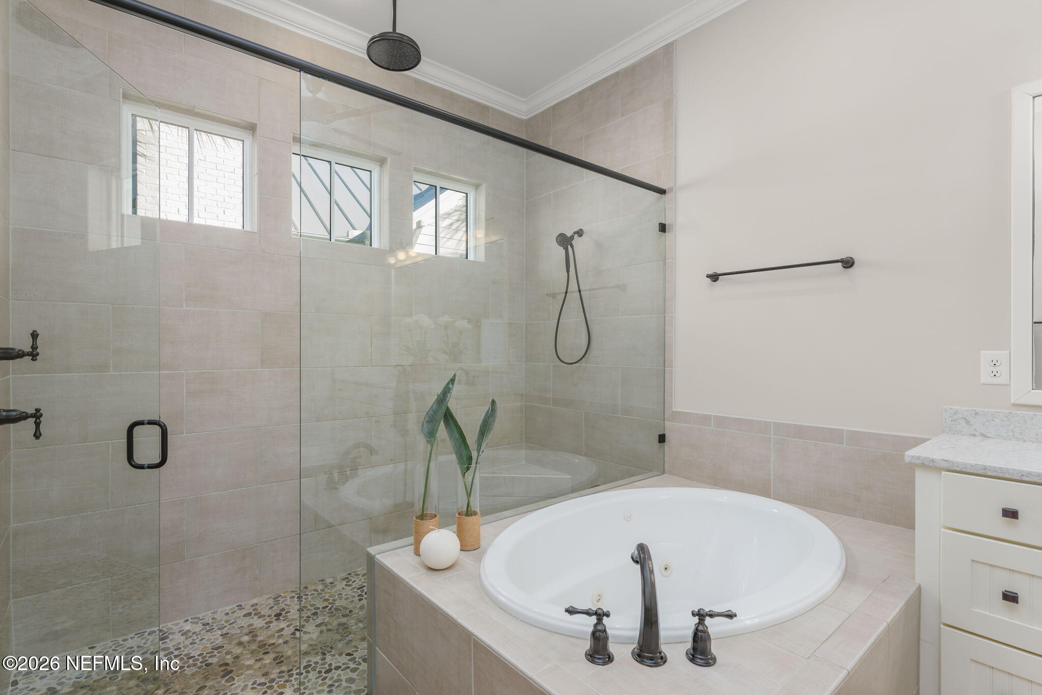 599 Timber Bridge Lane Atlantic Beach, FL 32233 - Photo 41 of 60 a bathroom with a tub and a shower