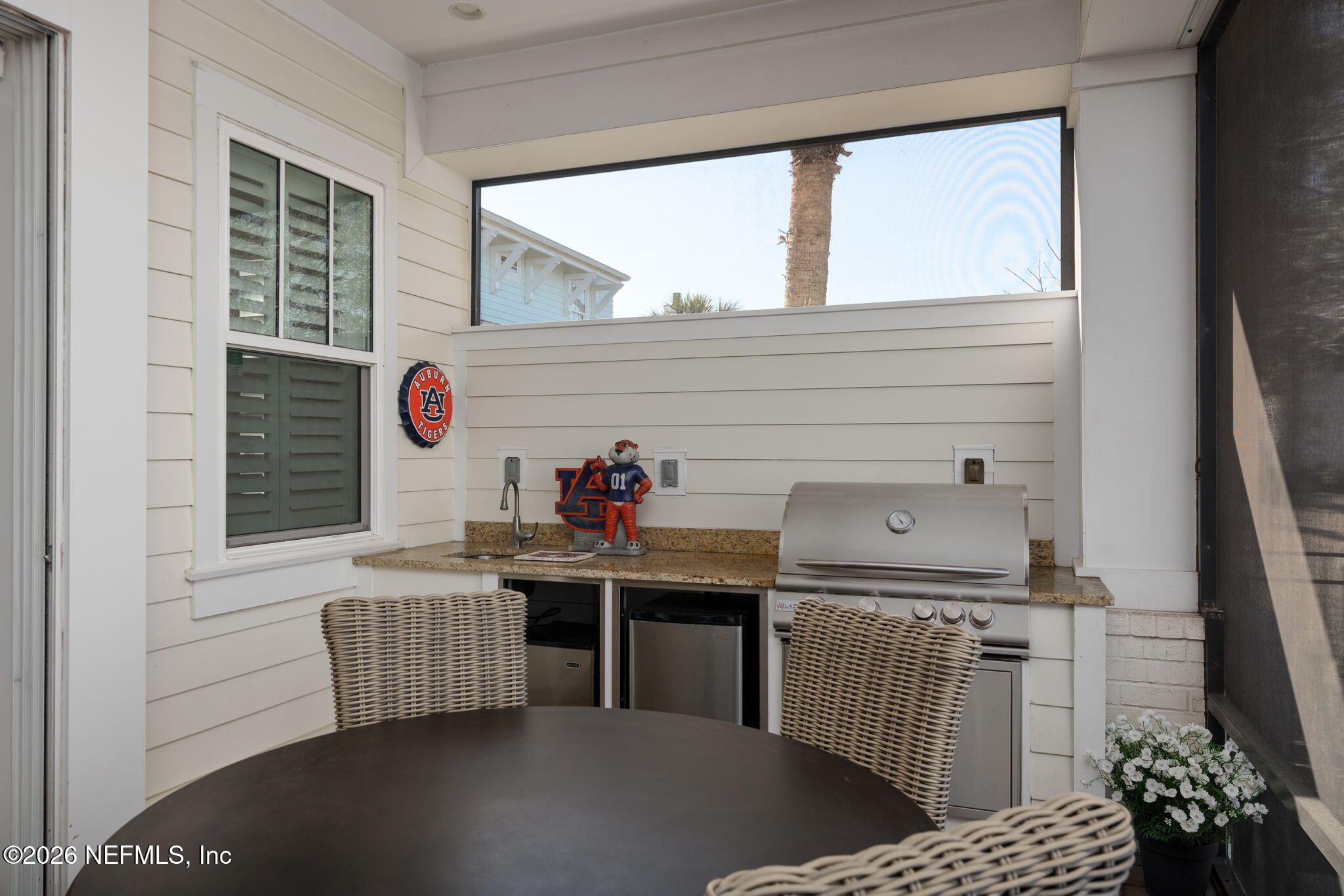 599 Timber Bridge Lane Atlantic Beach, FL 32233 - Photo 44 of 60 a kitchen with stainless steel appliances granite countertop a sink stove and cabinets
