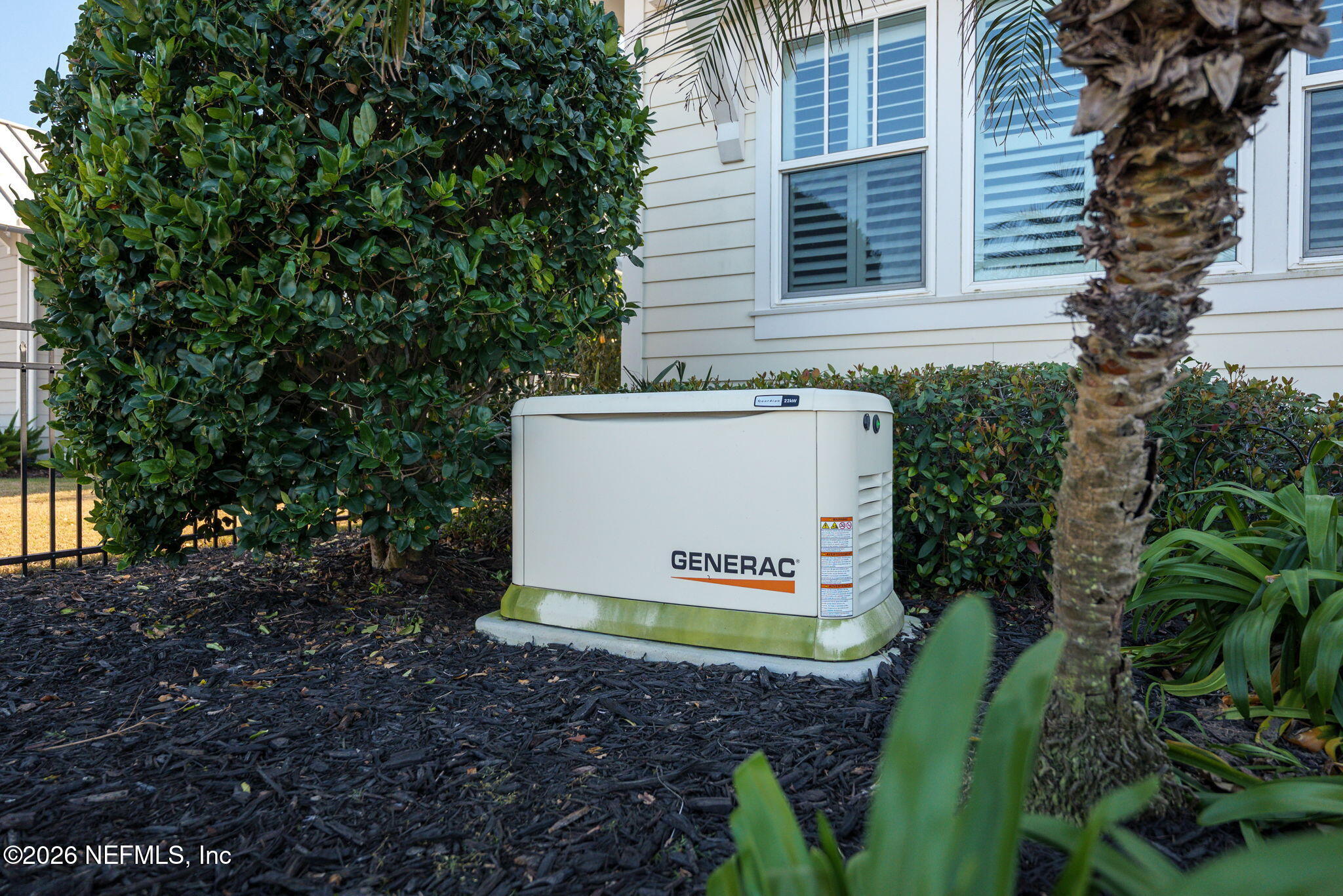 599 Timber Bridge Lane Atlantic Beach, FL 32233 - Photo 48 of 60 a view of a house with a yard