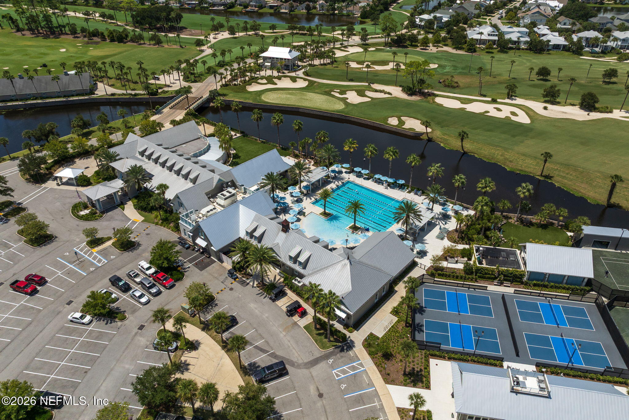 599 Timber Bridge Lane Atlantic Beach, FL 32233 - Photo 51 of 60 an aerial view of a house with a lake view