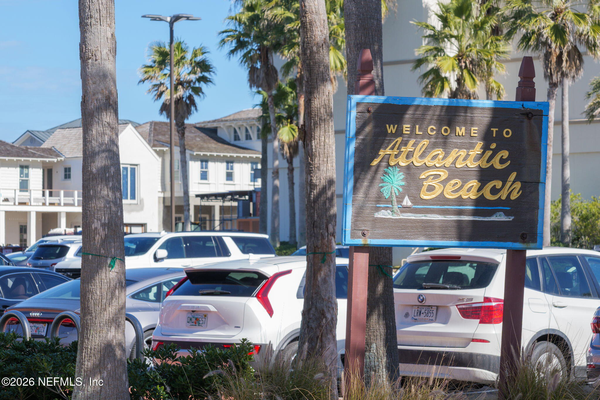 599 Timber Bridge Lane Atlantic Beach, FL 32233 - Photo 55 of 60 a front view of a house with garden and parking