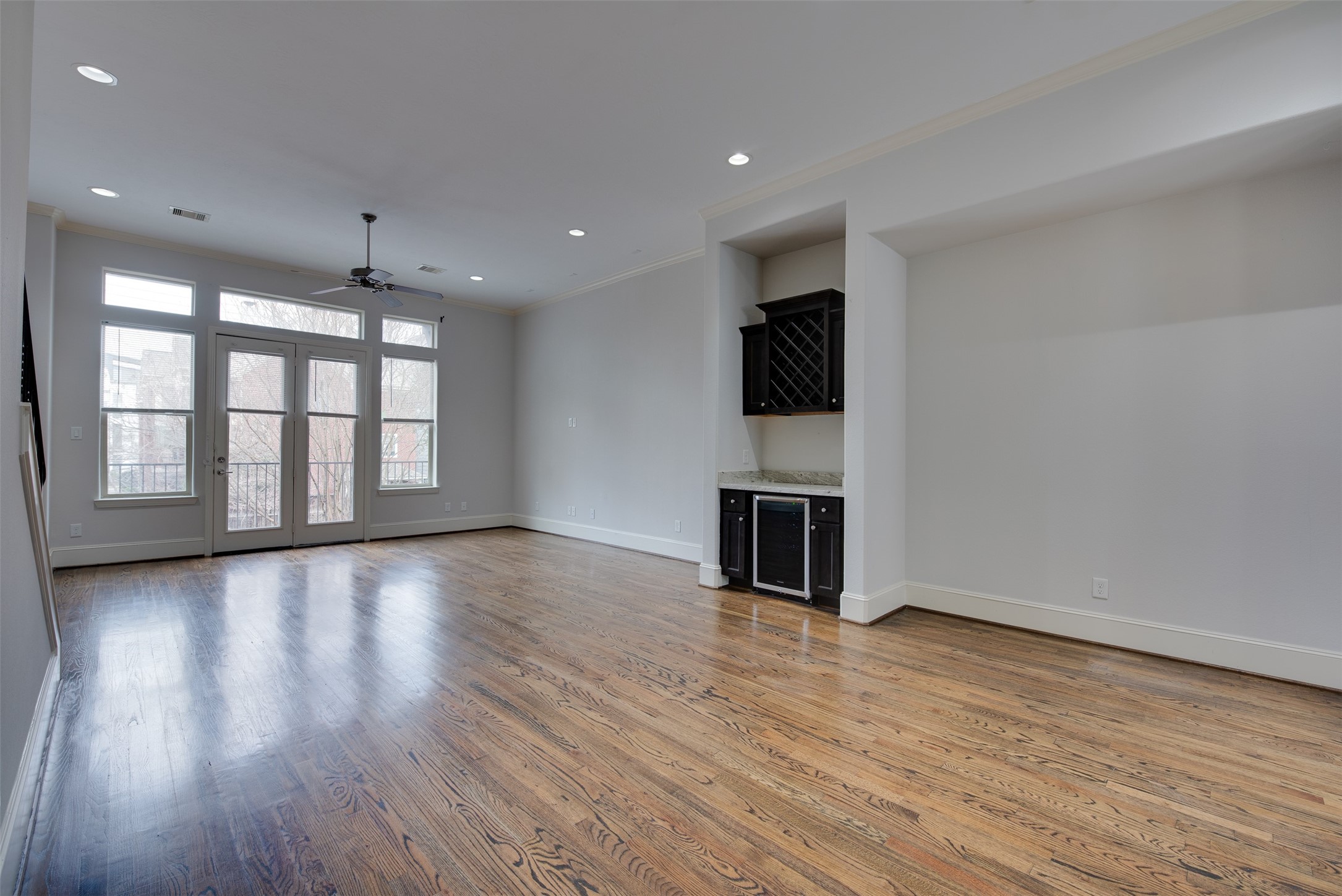 4203 Feagan Street Houston, TX 77007 - Photo 12 of 36 wooden floor in an empty room with a window