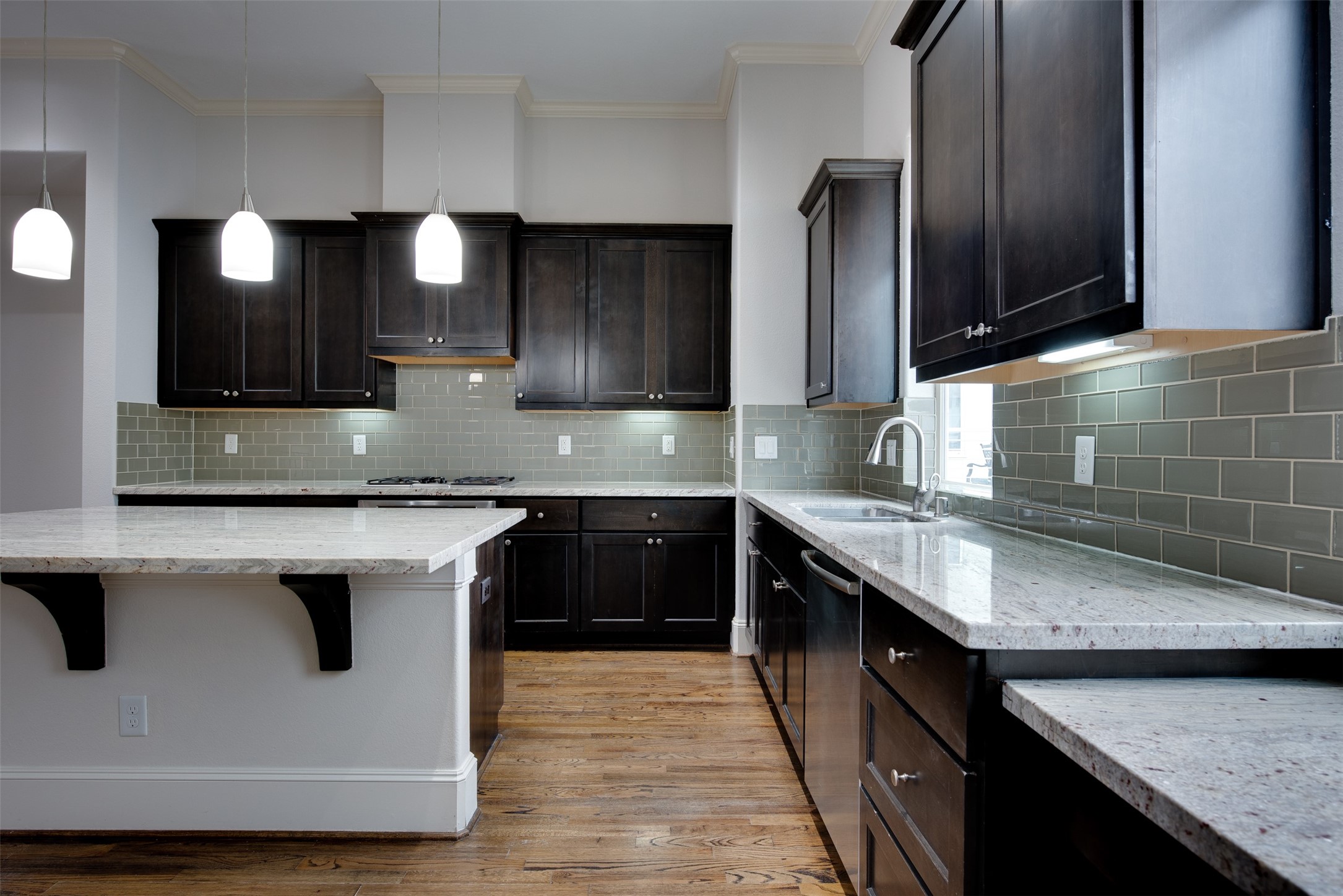 4203 Feagan Street Houston, TX 77007 - Photo 19 of 36 a kitchen with granite countertop a sink and stove